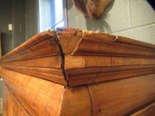 Lot 711 - A William & Mary walnut feather banded cabinet on chest, late 17th century