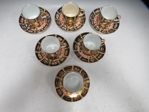 Lot 81 - A Royal Crown Derby 2451 pattern coffee cans...