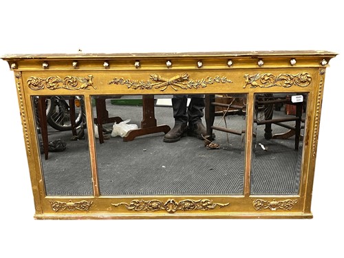 Lot 660 - A French Empire style giltwood overmantel...