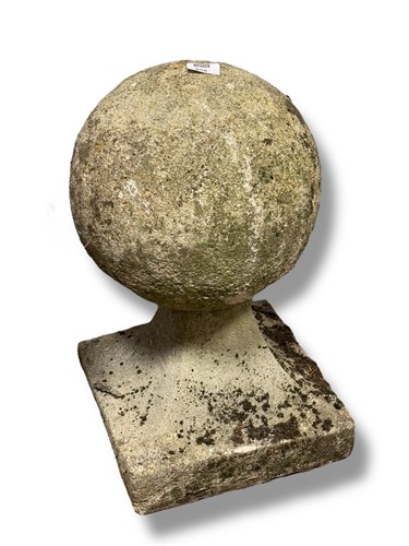 Lot 858 - A pair of composition stone gate post finials...