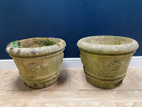 Lot 427 - A pair of composite stone planters, 43cm high,...