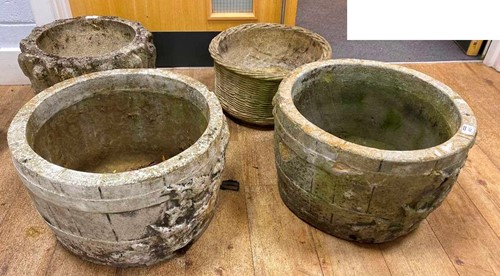 Lot 432 - A pair of composite stone circular planters...