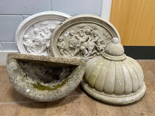 Lot 433 - A pair of oval relief plaques decorated with...
