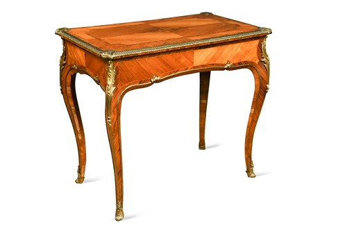 Lot 473 - A Louis XV style kingwood and ormolu mounted centre table