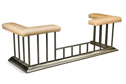 Lot 597 - A brushed steel club fender, modern