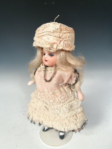 Lot 37 - A J.D. Kestner all bisque miniature mignonette closing eye doll