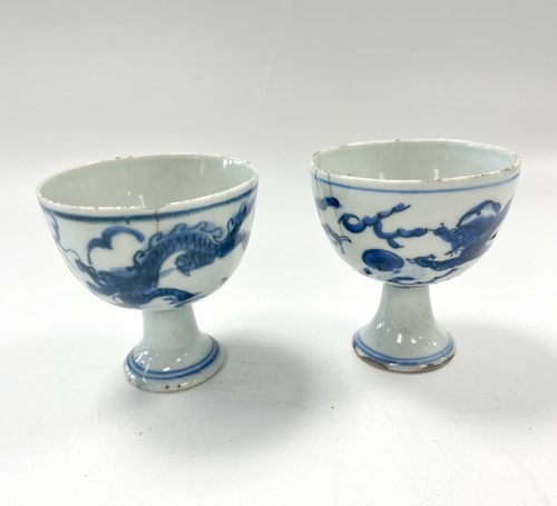 Lot 1 - Two Chinese blue and white porcelain dragon stem cups, late Ming Dynasty, circa 1600-1640