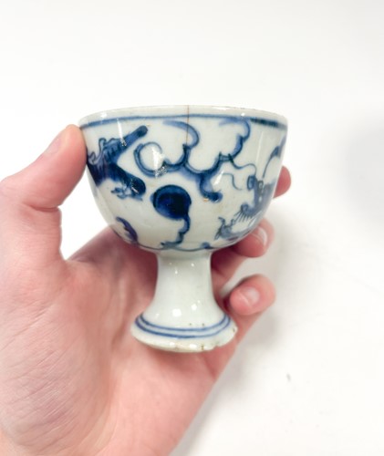 Lot 1 - Two Chinese blue and white porcelain dragon stem cups, late Ming Dynasty, circa 1600-1640