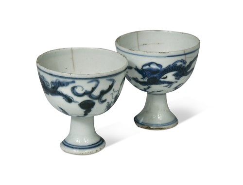 Lot 1 - Two Chinese blue and white porcelain dragon stem cups, late Ming Dynasty, circa 1600-1640