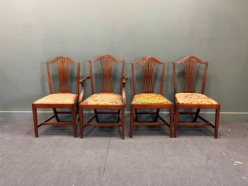 Lot 706 - A set of four George III style mahogany dining...