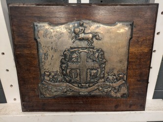 Lot 559 - A silver plated armorial crest 'Vis Unita...