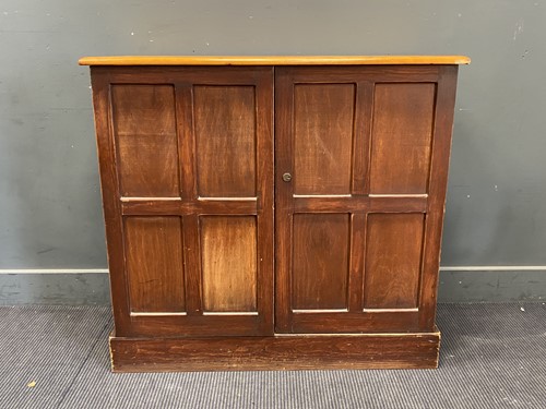 Lot 405 - Varnished pine cabinet with brass sunk handle...