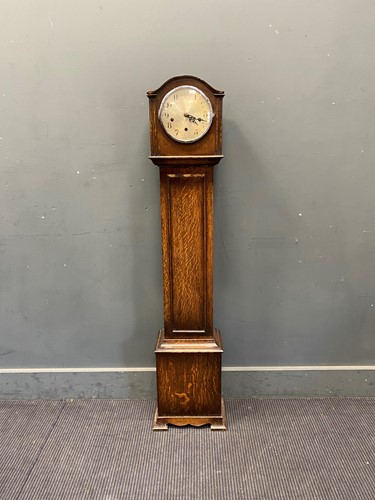 Lot 840 - A 1920s Enfield made in England stained oak...