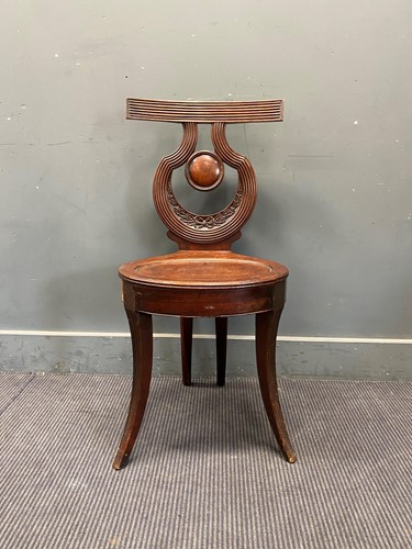 Lot 712 - A late 19th century Grecian style mahogany...