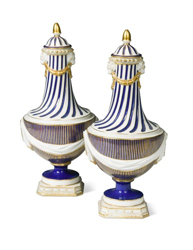 Lot 377 - A pair of Chelsea-Derby blue ground vases and covers, circa 1775-80