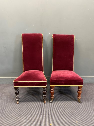 Lot 631 - A pair of Victorian fireside or slipper chairs...