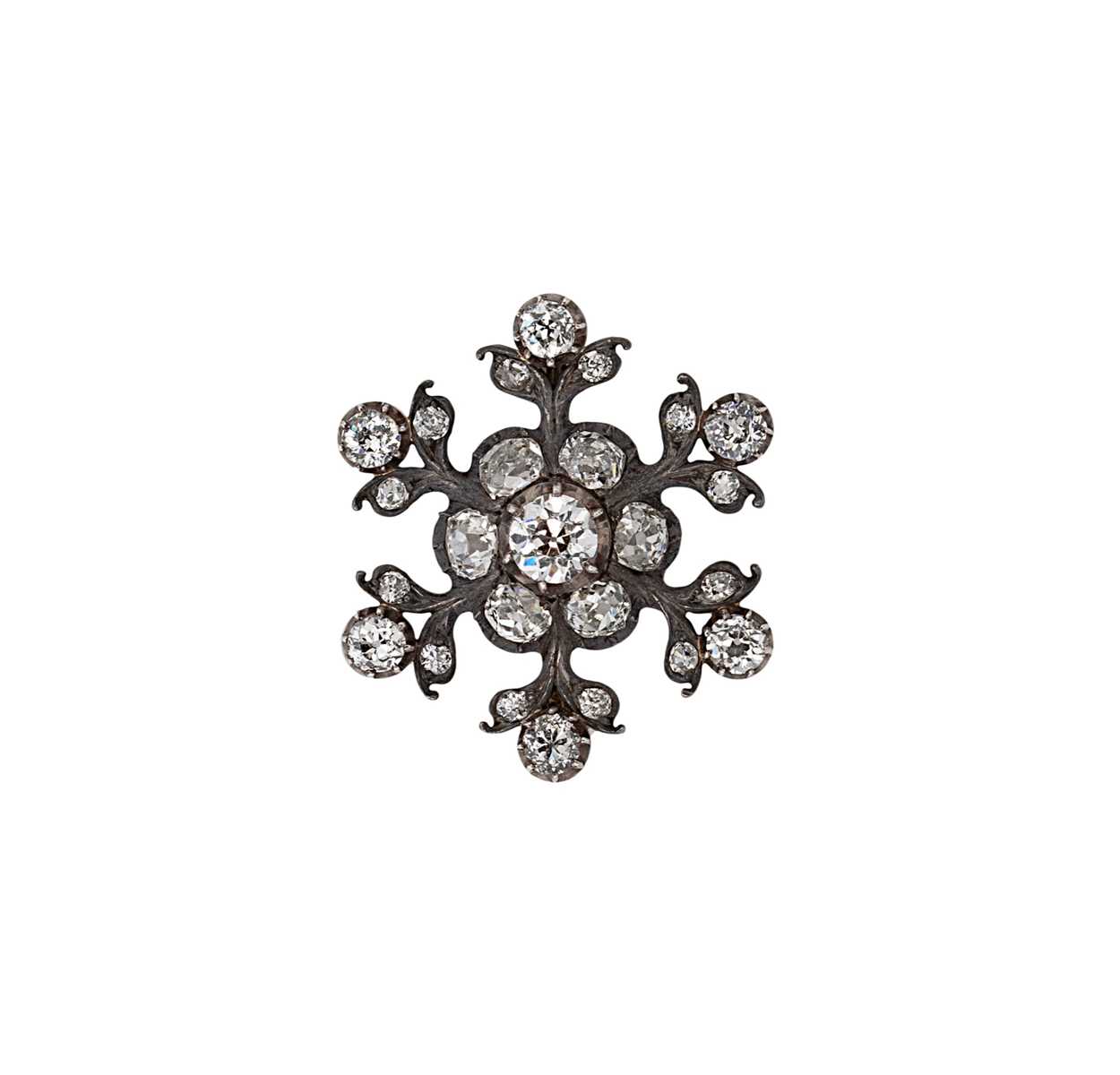 Lot 8 - A Victorian diamond set snowflake style brooch