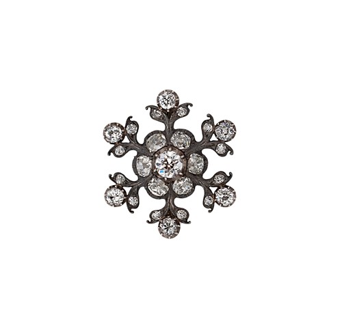 Lot 8 - A Victorian diamond set snowflake style brooch