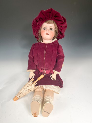 Lot 73 - A Schoenau & Hoffmeister bisque head doll, early 20th century