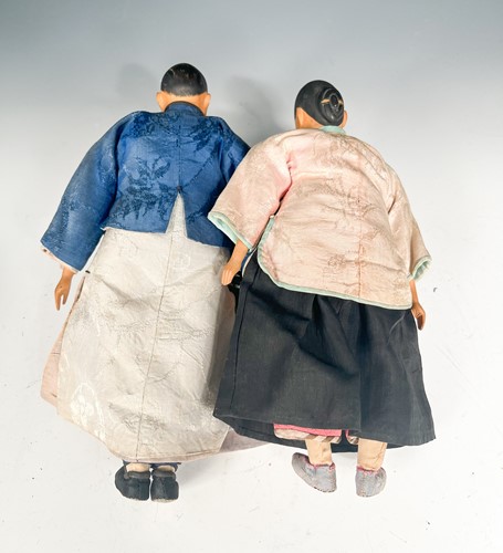 Lot 114 - Two Door of Hope Mission wooden dolls