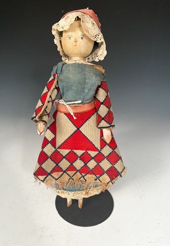 Lot 45 - A Victorian painted wood folk art peg doll