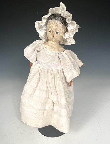 Lot 44 - A Victorian Grodnertal type painted wood peg doll