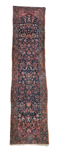 Lot 562 - A long Hamadan runner rug, circa 1910