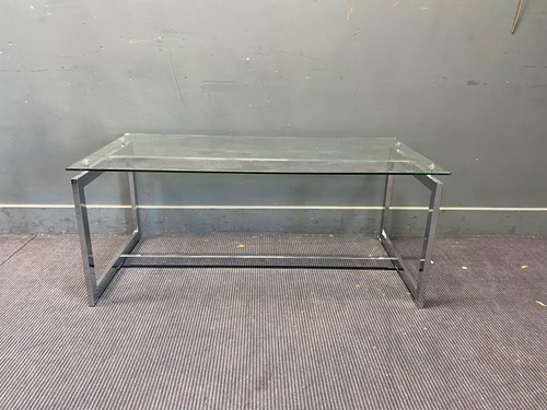 Lot 448 - Modern chrome and glass topped coffee table,...
