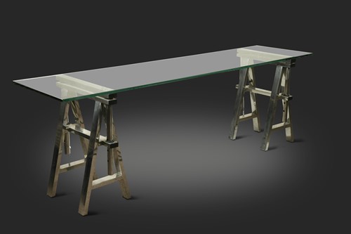 Lot 374 - A contemporary glass and chrome trestle console table