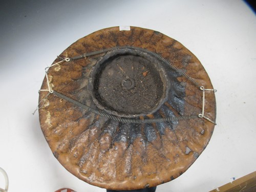 Lot 65 - A stoneware Studio pottery dish with heraldic...
