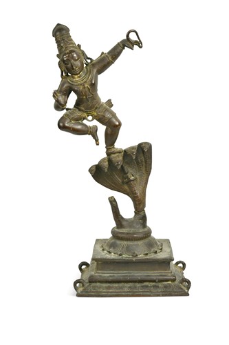 Lot 87 - An Indian bronze figure of Krishna dancing on Kaliya