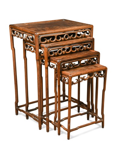 Lot 628 - A nest of four Chinese hardwood tables, early 20th century