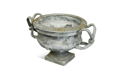 Lot 632 - An Edwardian lead twin handled garden urn