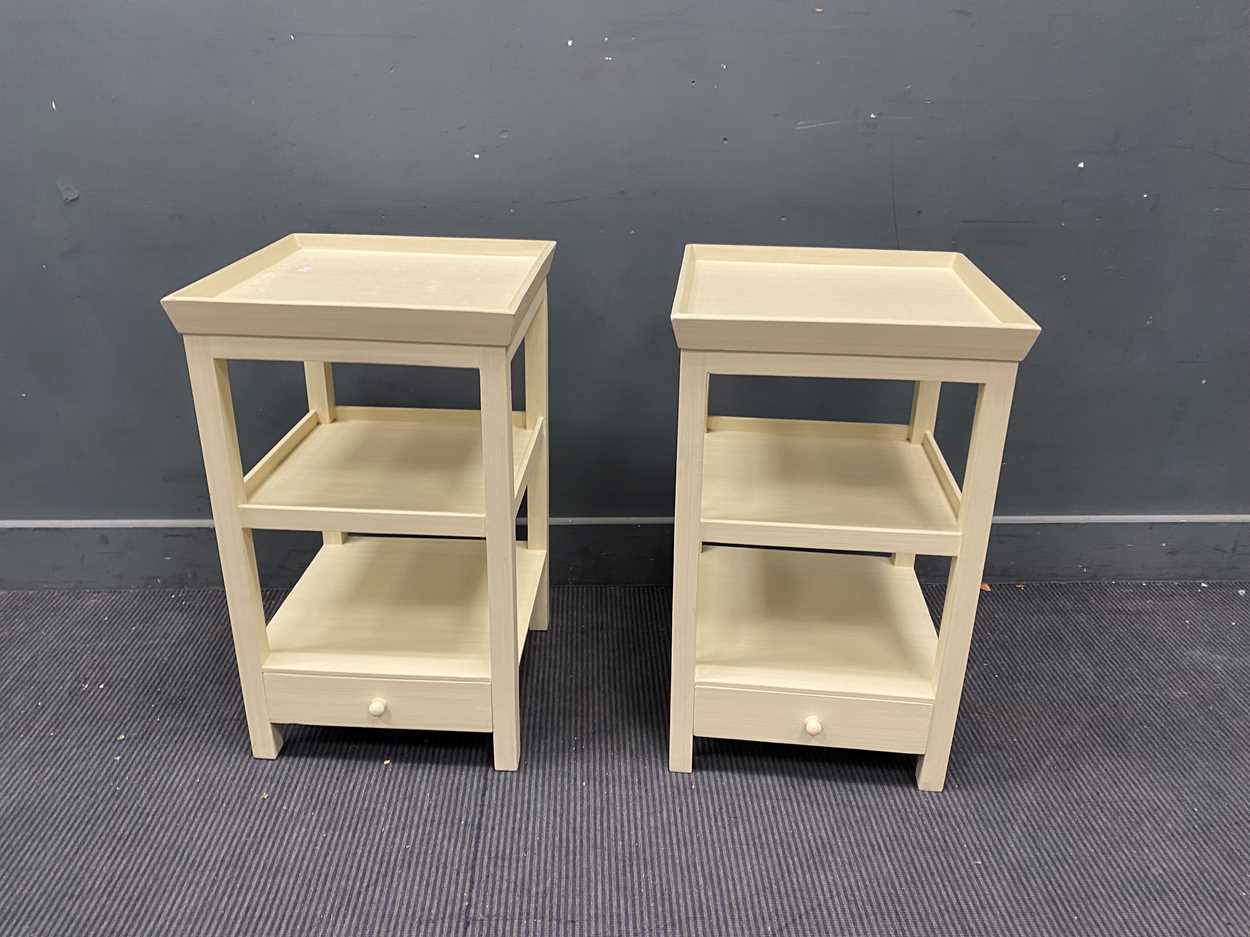 Lot 717 - A pair of cream painted OKA bedside tables,...