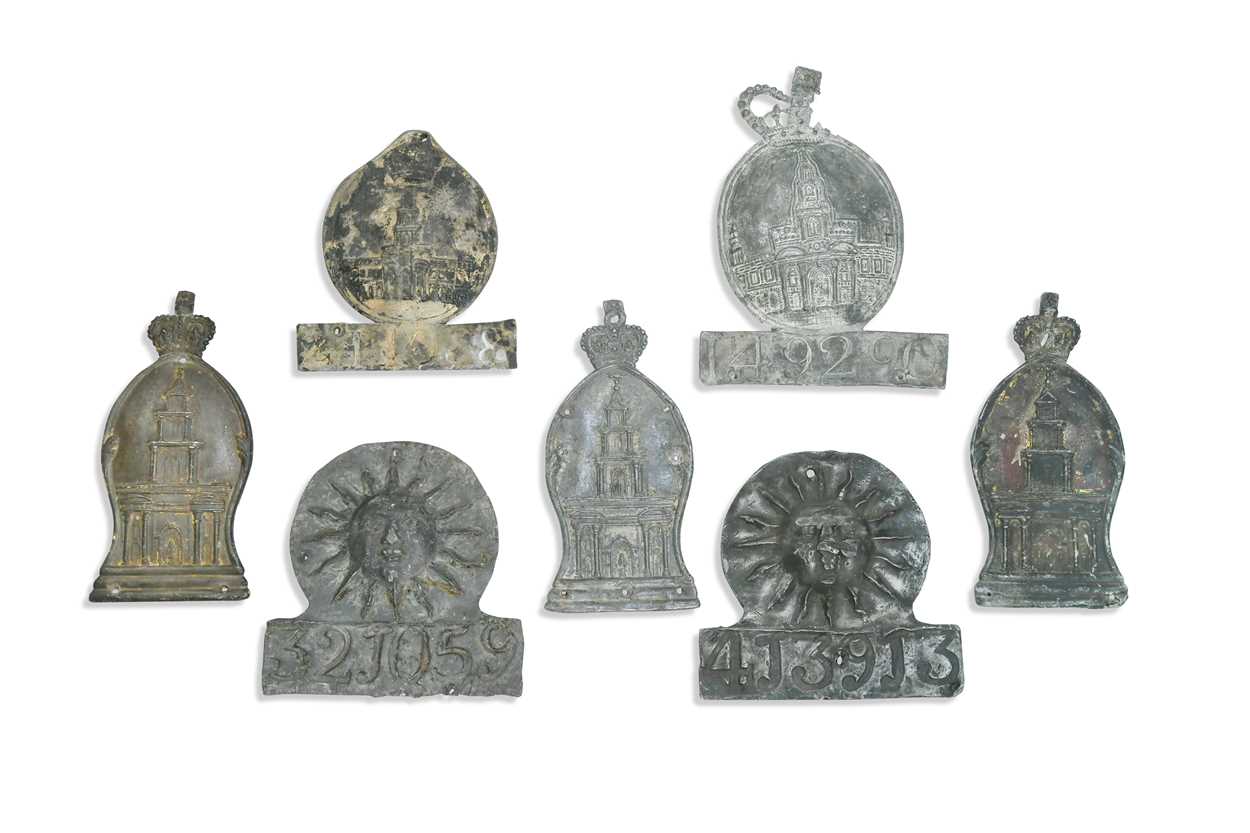 Lot 622 - A collection of seven lead fire insurance plaques or marks