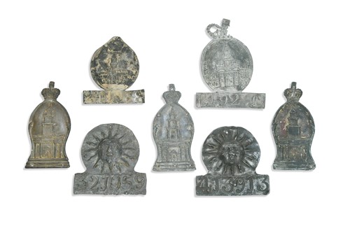Lot 622 - A collection of seven lead fire insurance plaques or marks
