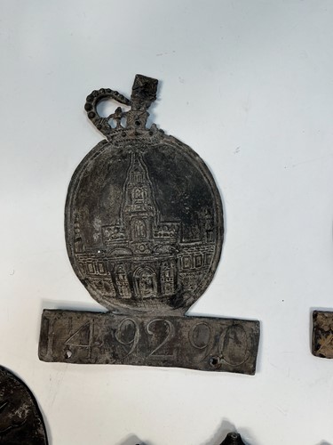 Lot 622 - A collection of seven lead fire insurance plaques or marks
