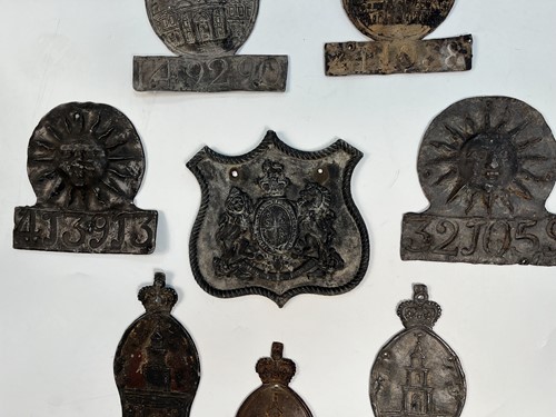 Lot 622 - A collection of seven lead fire insurance plaques or marks