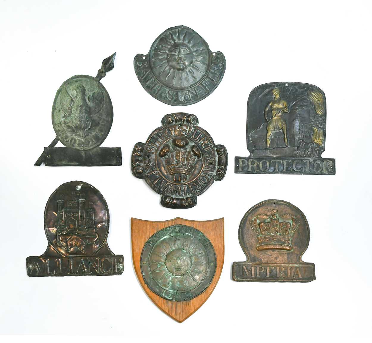 Lot 623 - A collection of thirteen copper fire insurance plaques or marks