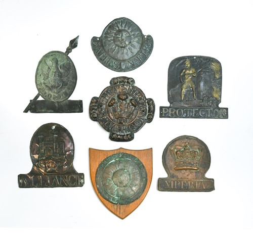 Lot 623 - A collection of thirteen copper fire insurance plaques or marks