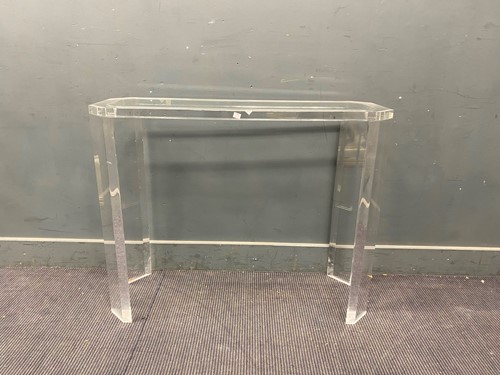 Lot 671 - A perspex console or side table with canted...