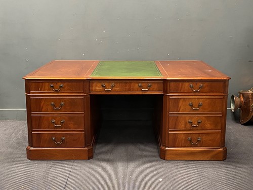 Lot 687 - A Georgian style pedestal desk of generous...