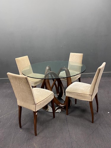Lot 727 - A modern circular table with sculptural smoked...