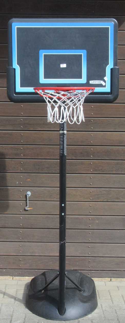 Lot 320 - A Lifetime adjustable basketball hoop.