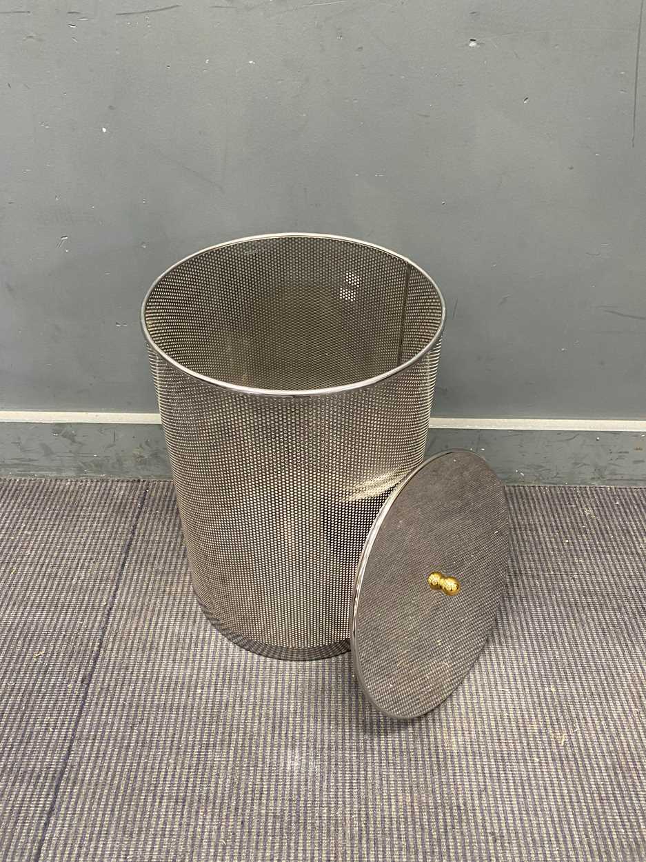 Lot 302 - A Chrome cylindrical laundry basket with gold...