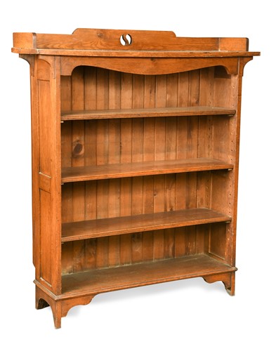 Lot 255 - A Liberty style Arts & Crafts oak open bookcase