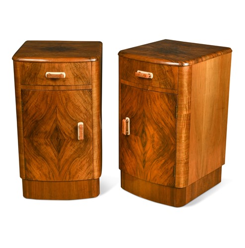 Lot 321 - A pair of Art Deco walnut bow front bedside cupboards