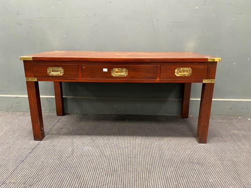 Lot 667 - A 20th century mahogany campaign style low...