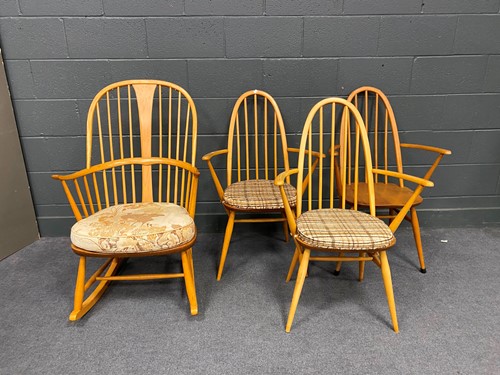 Lot 763 - An Ercol elm seated rocking armchair 103cm x...
