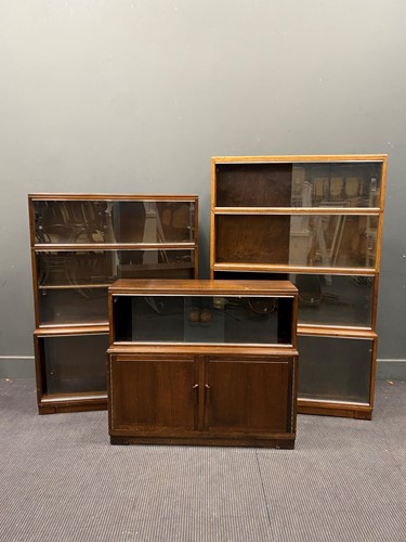 Lot 744 - A mahogany 'Minty' sectional bookcase with...